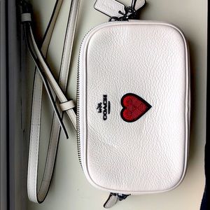 Heart Embroidered oval crossbody clutch bag